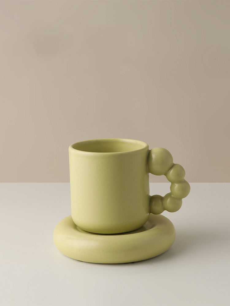 Creative Ceramic Mug With Rotating Ball Handle Design