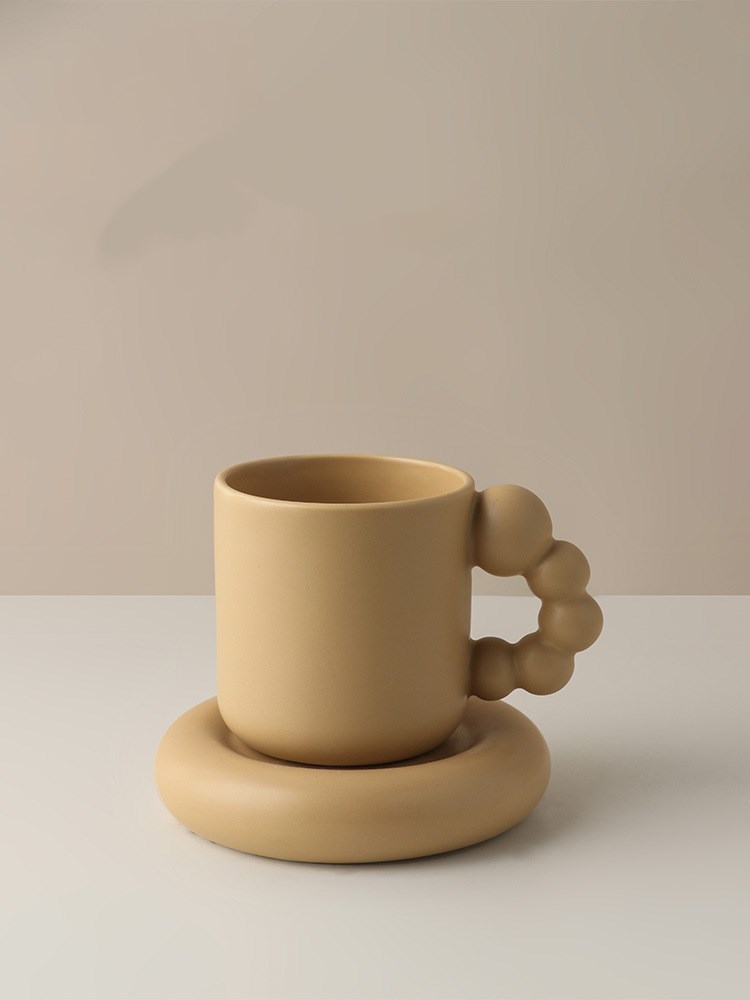 Creative Ceramic Mug With Rotating Ball Handle Design