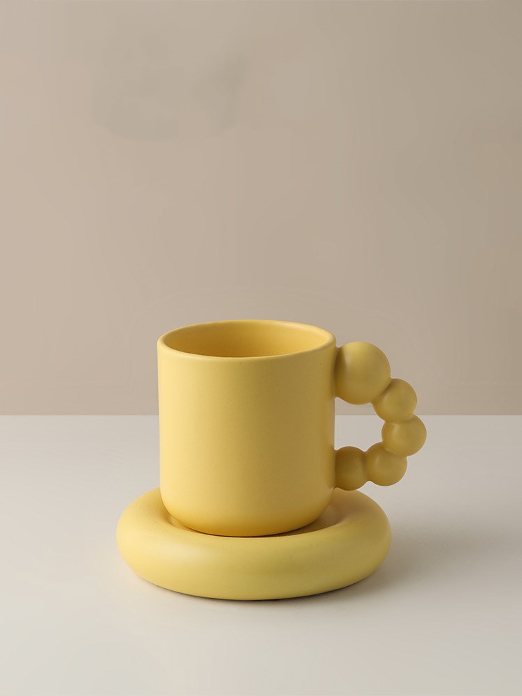 Creative Ceramic Mug With Rotating Ball Handle Design