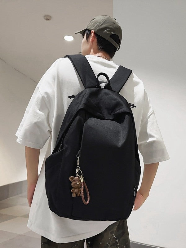 Large capacity school bag male high school student Korean version trendy travel backpack female junior high school student simple solid color backpack