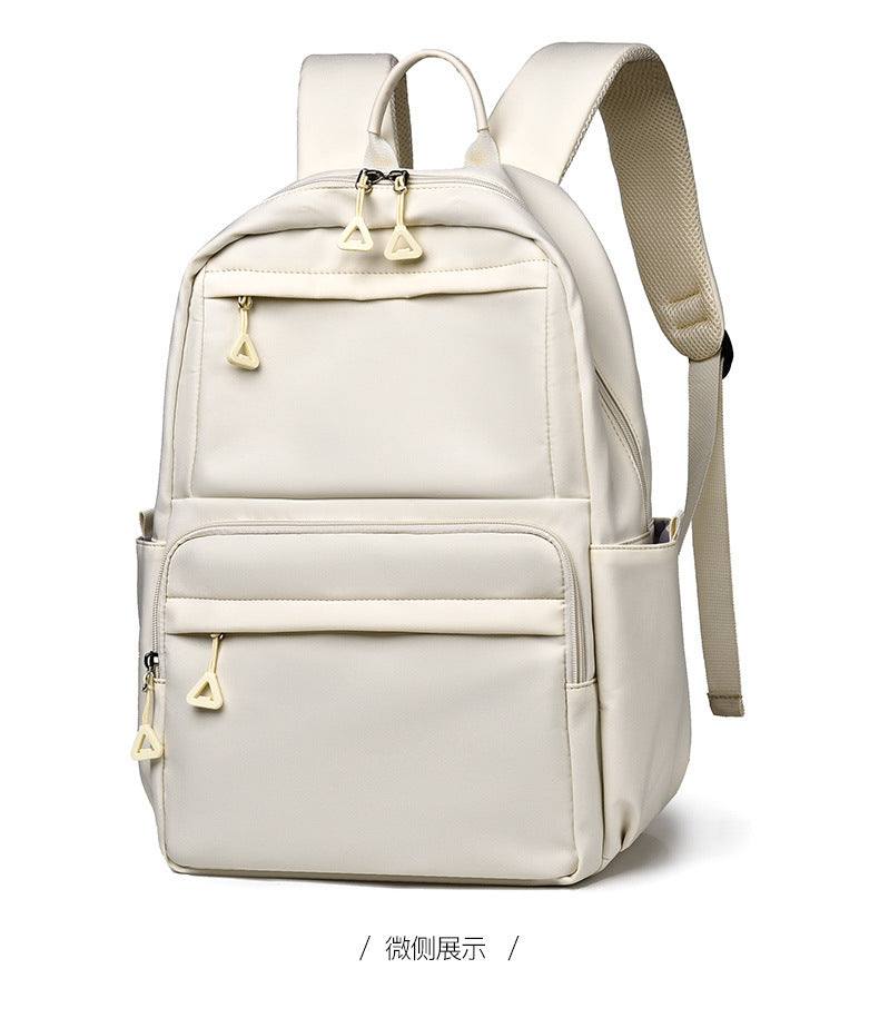 New backpack backpack 14 inch Korean simple student large capacity junior high and high school student casual wholesale