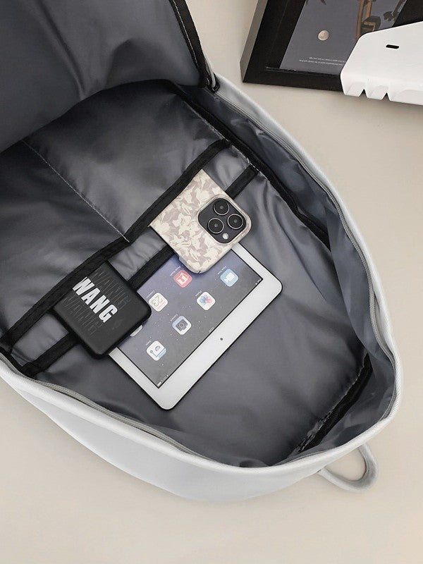 Large capacity school bag male high school student Korean version trendy travel backpack female junior high school student simple solid color backpack