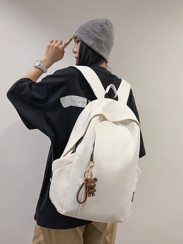Large capacity school bag male high school student Korean version trendy travel backpack female junior high school student simple solid color backpack